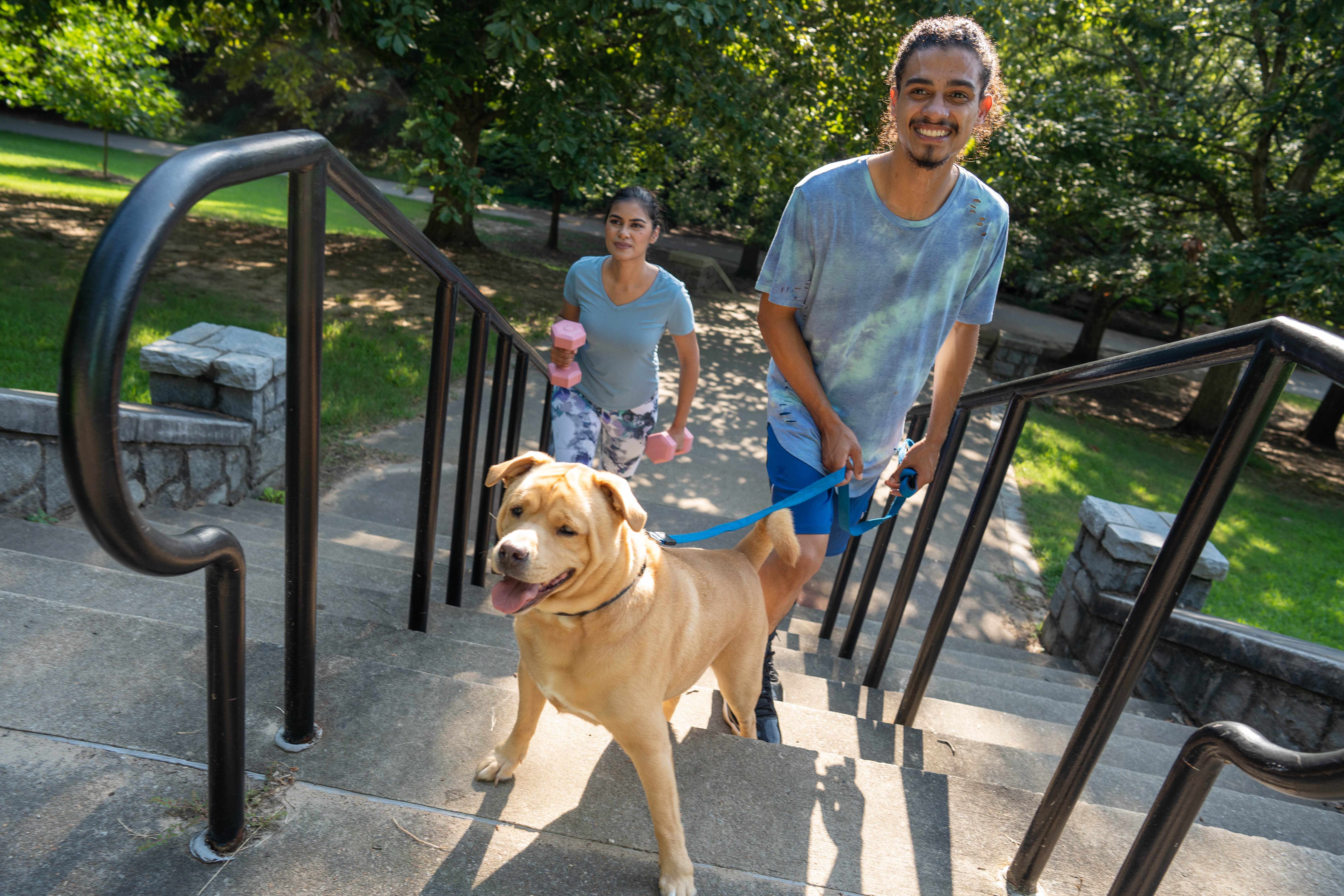 More Details about Couple Exercising with Dog - 1