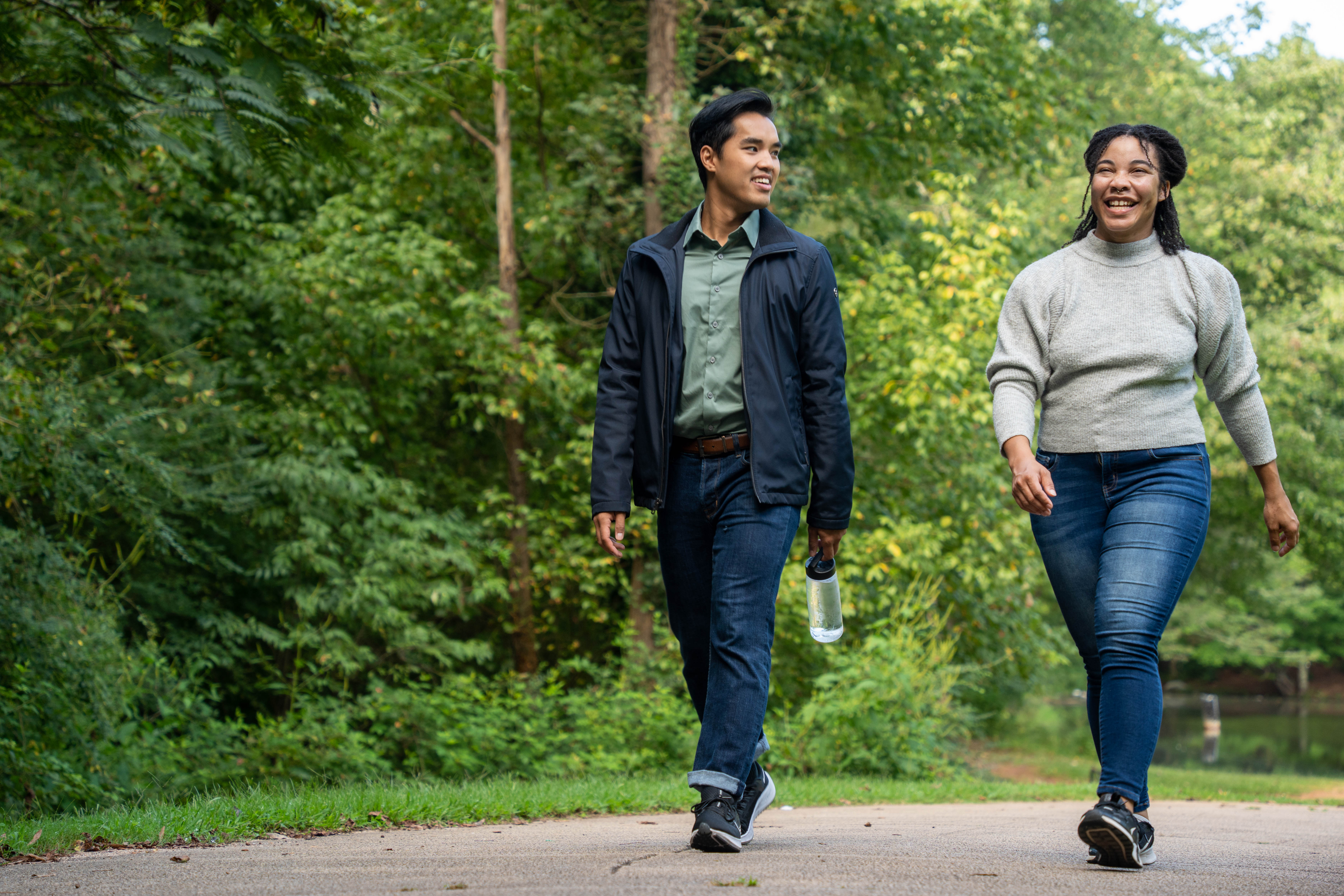 More Details about Couple Walking Near Pond - 1