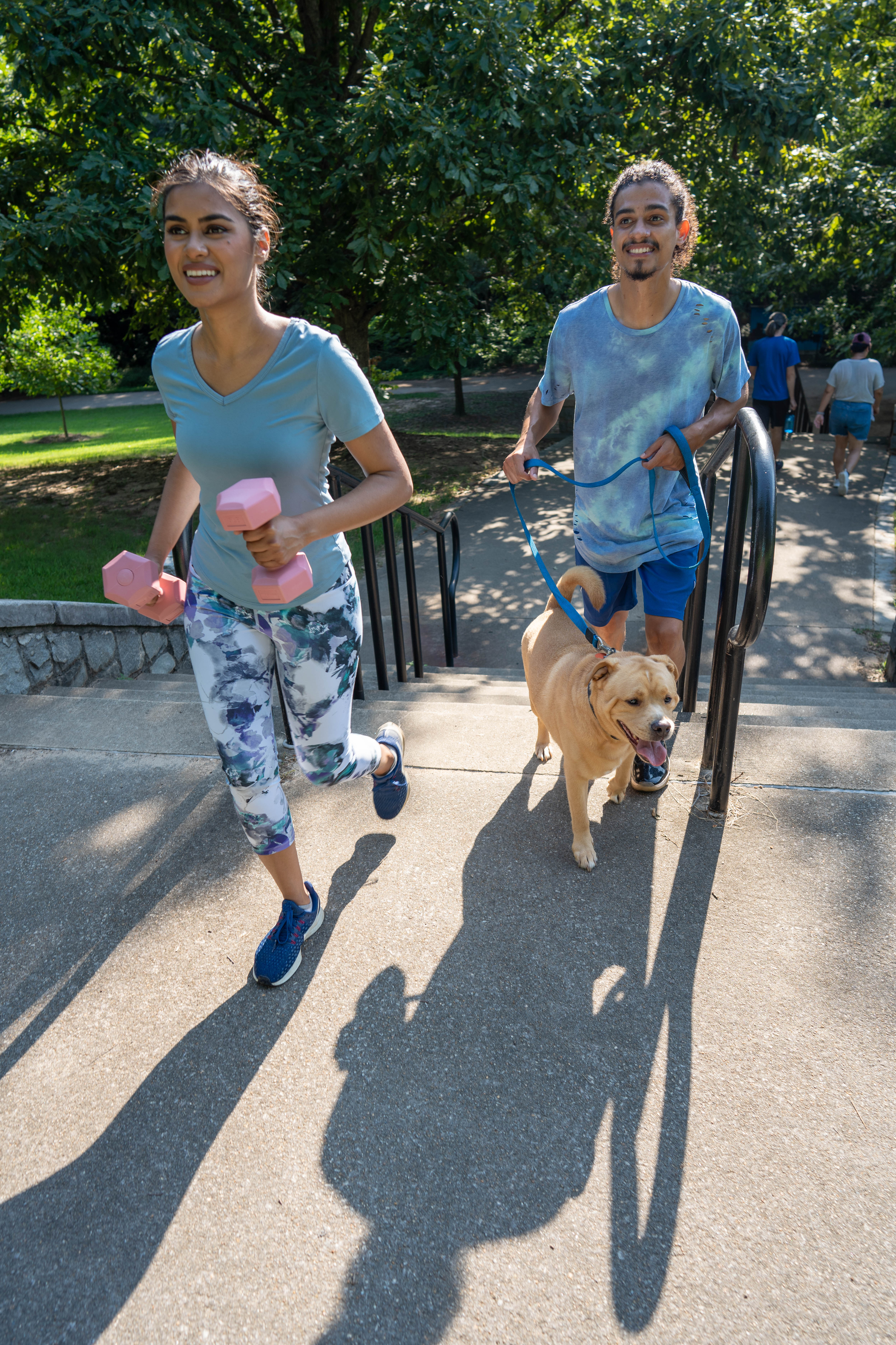 More Details about Couple Exercising with Dog - 2