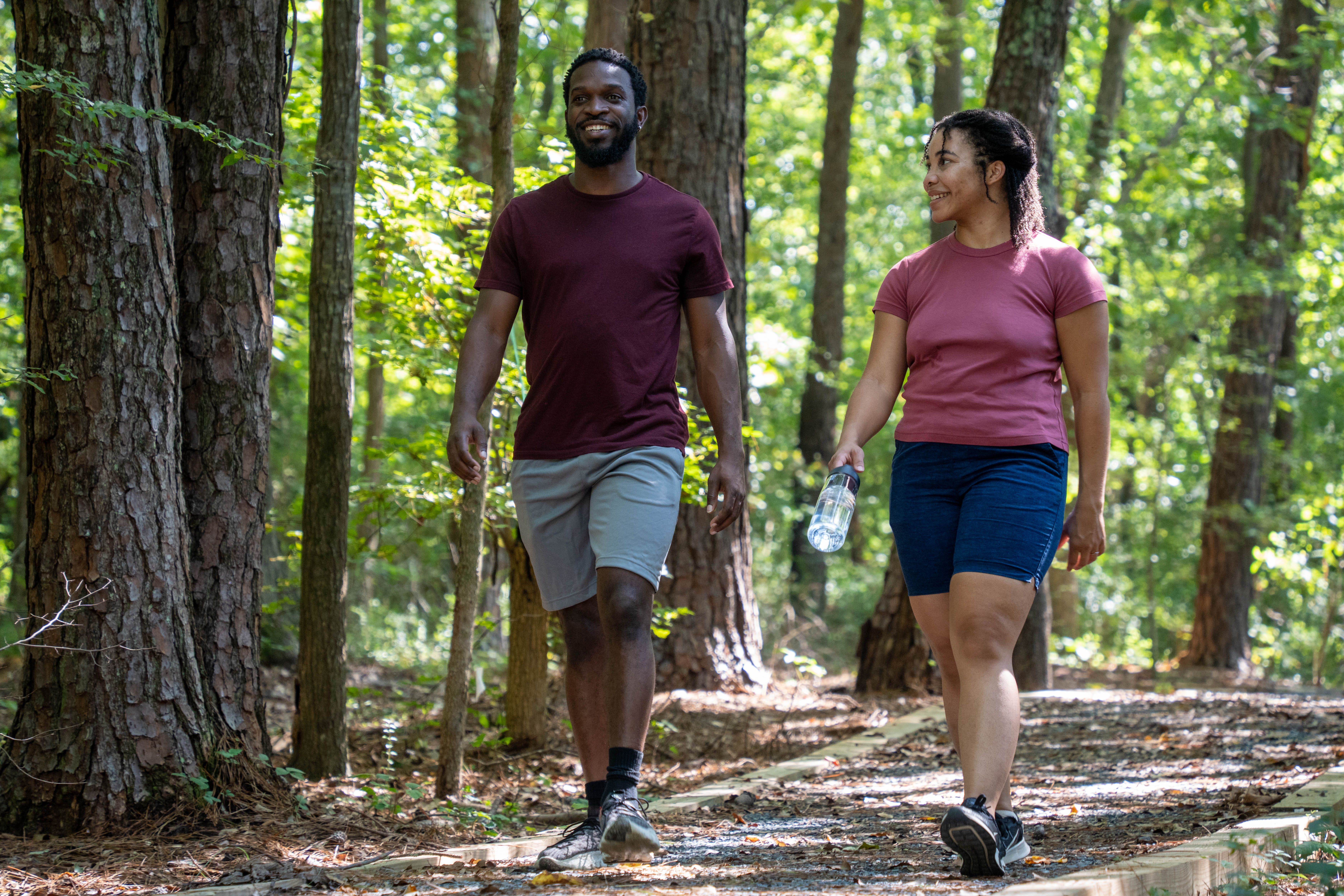 More Details about Couple Walking on Trail - 2